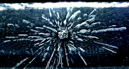 a cloud chamber with uranium inside